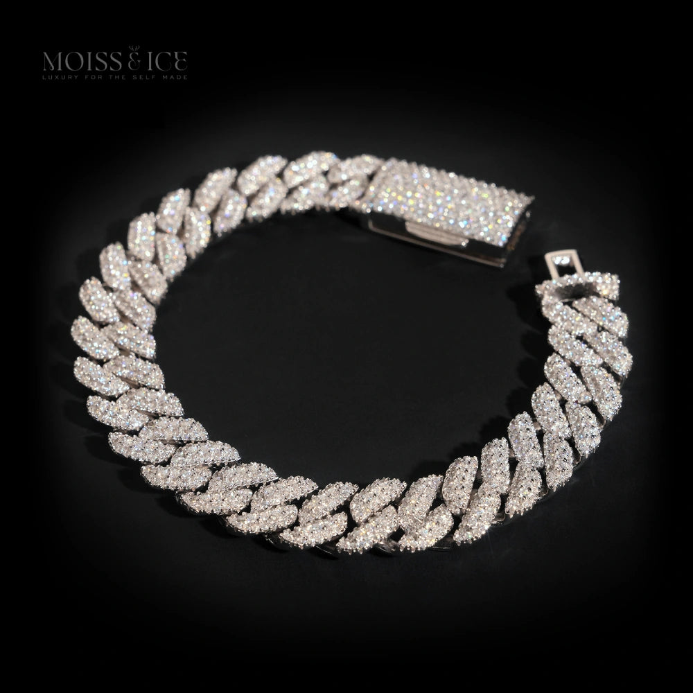 Moissanite Iced out chain bracelet with diamond-like stones branded Moiss and Ice.